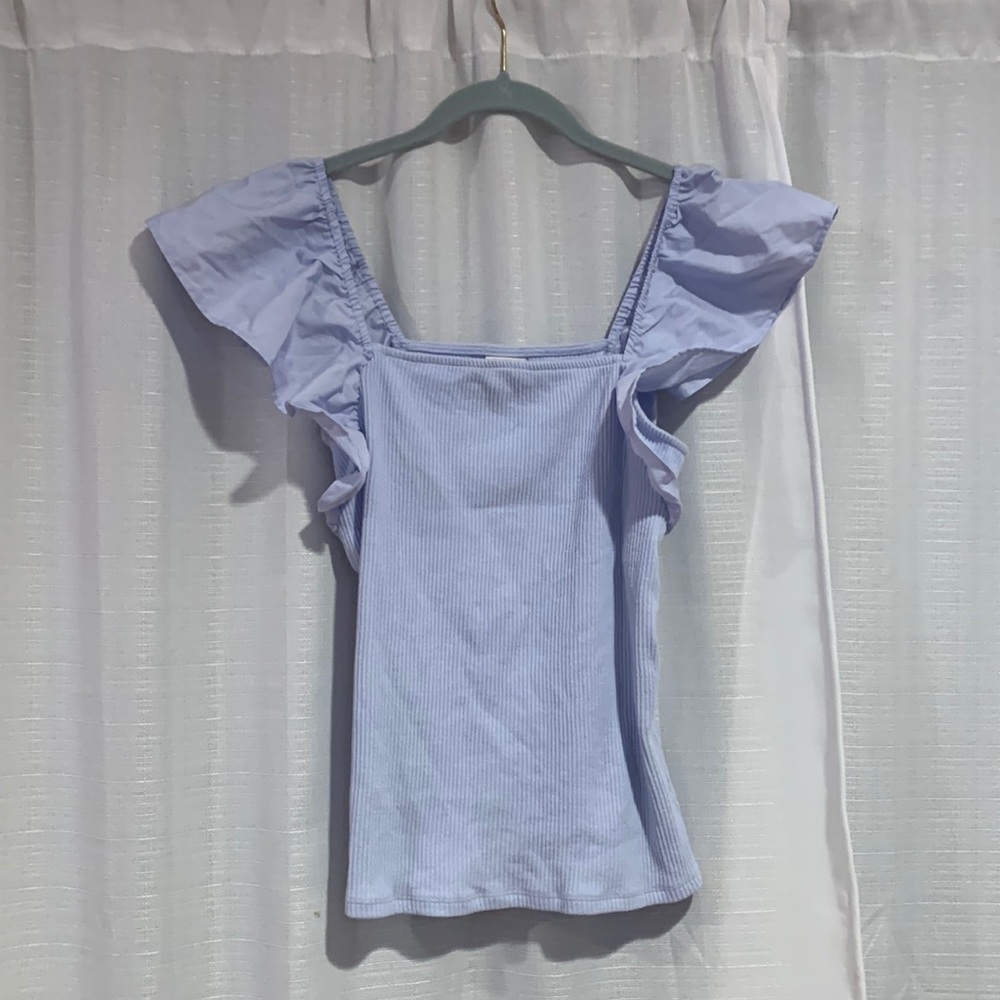 Light blue top